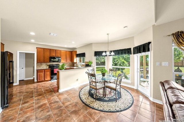 3353 Joshs Way, Marion, TX 78124 - kitchen with black appliances, brown cabinets, decorative backsplash, recessed lighting, and open floor plan