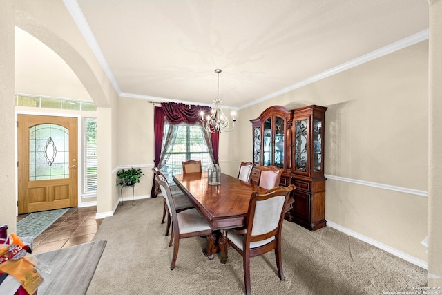 3353 Joshs Way, Marion, TX 78124 - dining space with a chandelier, ornamental molding, arched walkways, light carpet, and baseboards