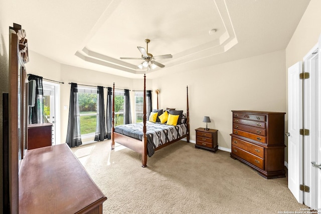 3353 Joshs Way, Marion, TX 78124 - bedroom featuring a raised ceiling, light carpet, baseboards, and ceiling fan