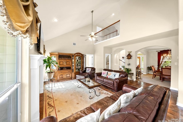 3353 Joshs Way, Marion, TX 78124 - living area featuring arched walkways, high vaulted ceiling, a ceiling fan, baseboards, and a fireplace