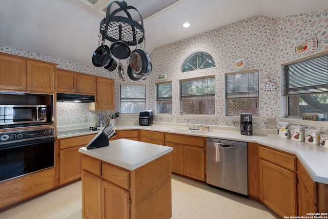 5626 Timber Strm, San Antonio, TX 78250 - kitchen with dishwasher, black oven, wallpapered walls, under cabinet range hood, and electric stovetop