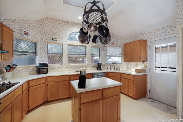 5626 Timber Strm, San Antonio, TX 78250 - kitchen with lofted ceiling, light floors, black electric cooktop, stainless steel dishwasher, and wallpapered walls