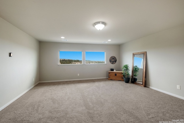 23414 Seven Winds, San Antonio, TX 78258 - carpeted spare room with baseboards and recessed lighting
