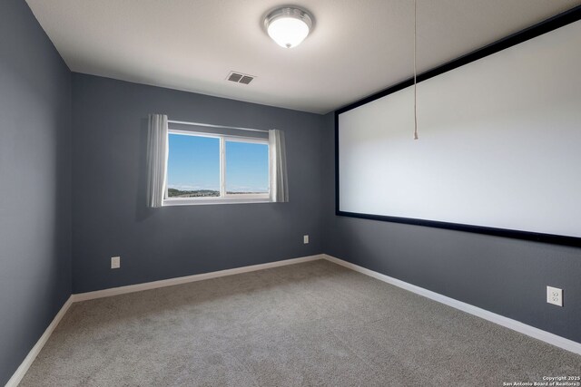 23414 Seven Winds, San Antonio, TX 78258 - carpeted cinema featuring baseboards