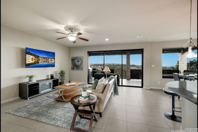 23414 Seven Winds, San Antonio, TX 78258 - living room with a ceiling fan, tile patterned floors, baseboards, and recessed lighting