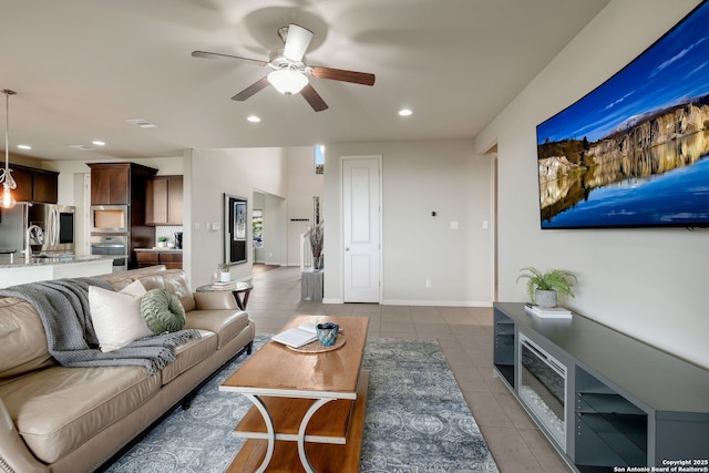 23414 Seven Winds, San Antonio, TX 78258 - living room featuring light tile patterned floors, ceiling fan, and recessed lighting