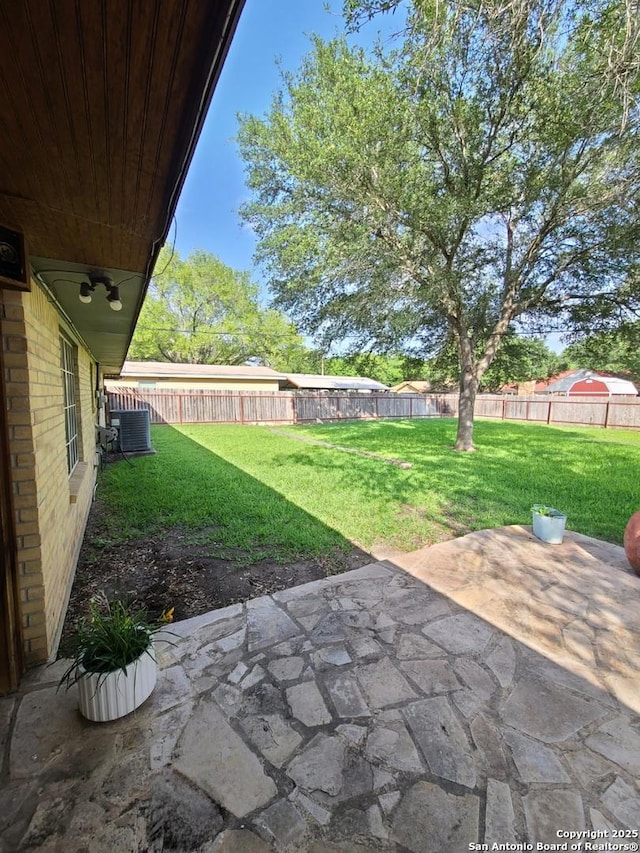 117 Larkspur, Uvalde, TX 78801 - view of yard with a patio area and central AC unit