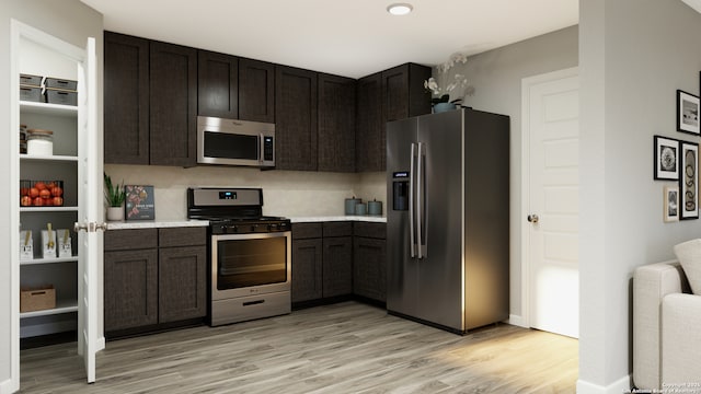10323 Fuji Ct, San Antonio, TX 78224 - kitchen with appliances with stainless steel finishes, light wood-style flooring, light countertops, and baseboards