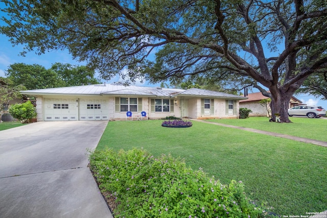 713 Fawndale, Windcrest, TX 78239 - single story home with an attached garage, driveway, a standing seam roof, a front lawn, and metal roof
