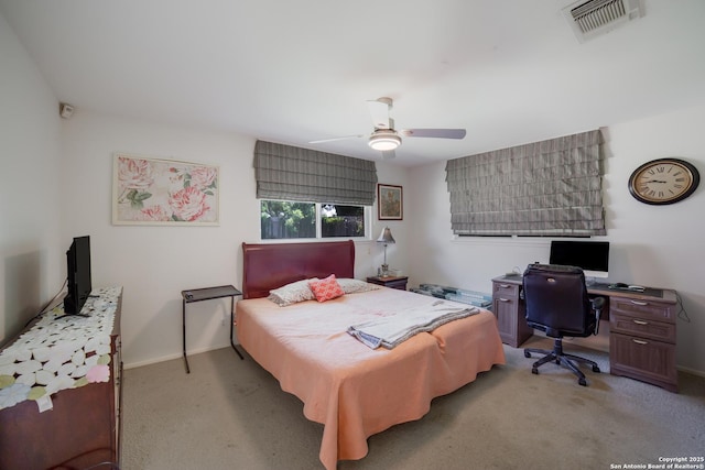 713 Fawndale, Windcrest, TX 78239 - bedroom featuring light carpet, a desk, a ceiling fan, and baseboards