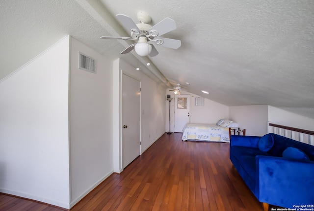 713 Fawndale, Windcrest, TX 78239 - bedroom featuring lofted ceiling, hardwood / wood-style floors, a textured ceiling, baseboards, and a ceiling fan