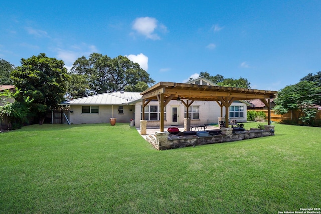 713 Fawndale, Windcrest, TX 78239 - back of property with a pergola, a patio area, a standing seam roof, brick siding, and metal roof