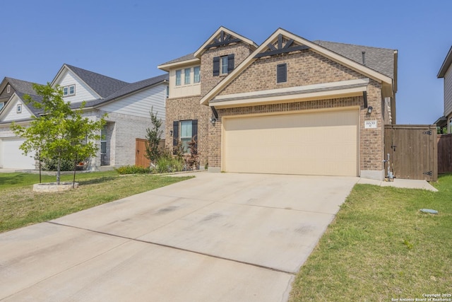 8639 Hedford, San Antonio, TX 78254 - view of front facade featuring brick siding, driveway, a front yard, and a garage