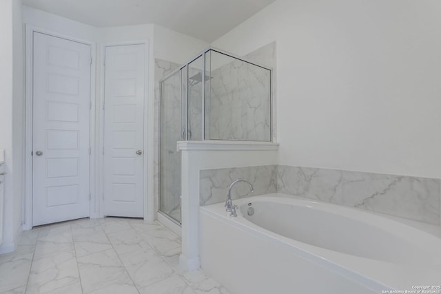 8639 Hedford, San Antonio, TX 78254 - bathroom featuring marble finish flooring, a garden tub, and a marble finish shower
