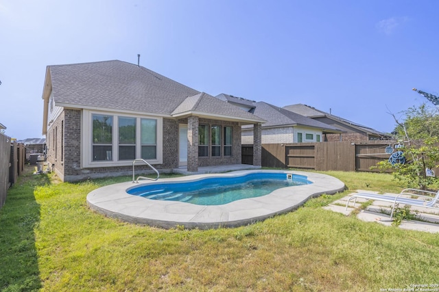 8639 Hedford, San Antonio, TX 78254 - back of house featuring brick siding and a shingled roof