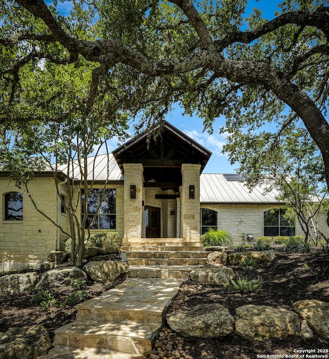 112 Legend Holw, Boerne, TX 78006 - view of front of home featuring a standing seam roof, metal roof, and stone siding