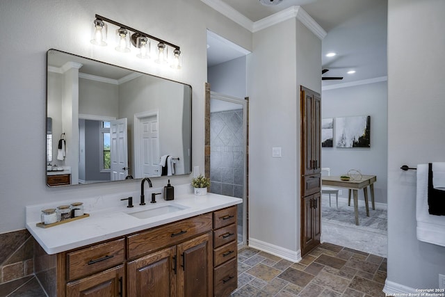 112 Legend Holw, Boerne, TX 78006 - full bath with crown molding, vanity, stone tile flooring, baseboards, and recessed lighting