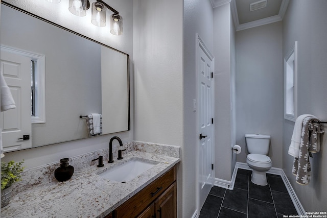 112 Legend Holw, Boerne, TX 78006 - bathroom with tile patterned floors, ornamental molding, vanity, toilet, and baseboards