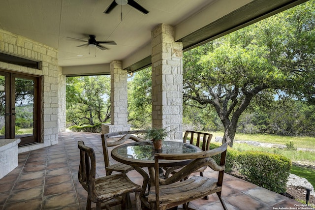 112 Legend Holw, Boerne, TX 78006 - view of patio / terrace with a ceiling fan, outdoor dining space, and french doors