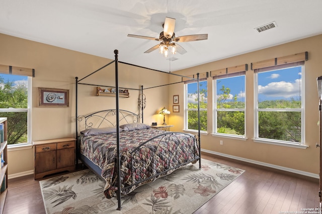 212 Vista Vw, Spring Branch, TX 78070 - bedroom featuring baseboards, hardwood / wood-style floors, and a ceiling fan