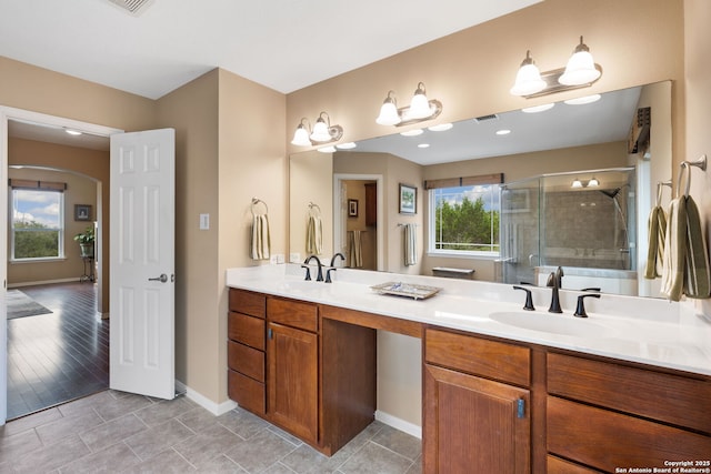212 Vista Vw, Spring Branch, TX 78070 - bathroom with double vanity, a shower stall, and baseboards