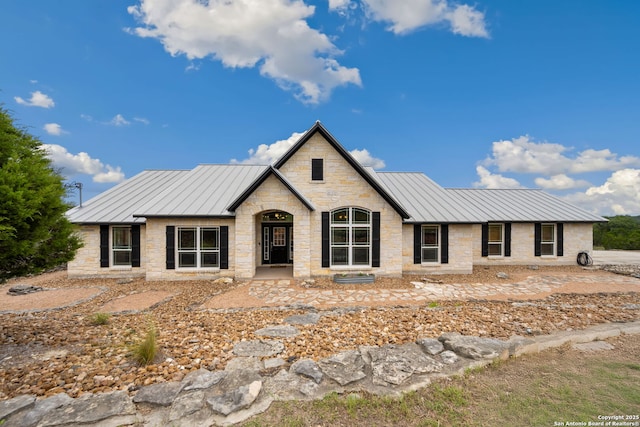 212 Vista Vw, Spring Branch, TX 78070 - view of front of home with a standing seam roof, metal roof, and stone siding