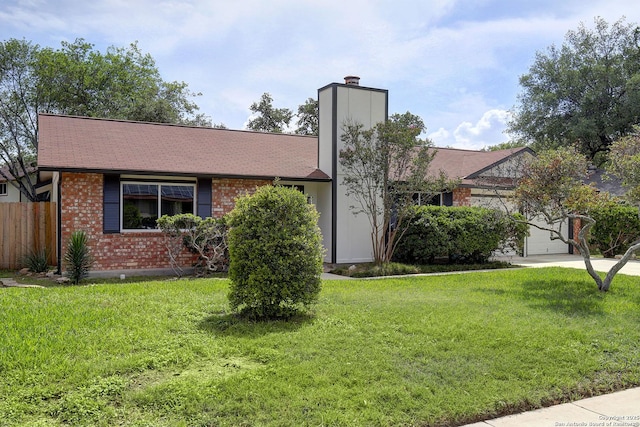 2714 Floral Way, San Antonio, TX 78247 - view of front of home with brick siding, a chimney, and an attached garage