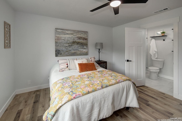 2714 Floral Way, San Antonio, TX 78247 - bedroom featuring wood finished floors, ensuite bathroom, and a ceiling fan