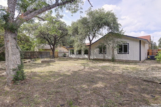 2714 Floral Way, San Antonio, TX 78247 - fenced backyard with a fire pit