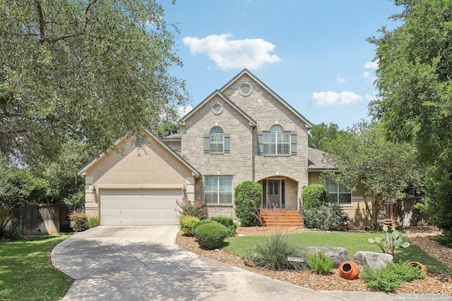 2929 Mccaskey Rdg, San Antonio, TX 78258 - traditional-style home with stone siding, concrete driveway, and a garage