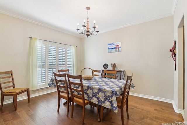 2929 Mccaskey Rdg, San Antonio, TX 78258 - dining room featuring a chandelier, crown molding, wood finished floors, and baseboards