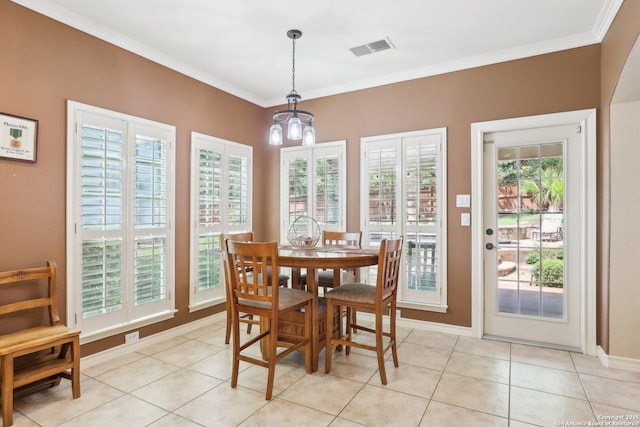 2929 Mccaskey Rdg, San Antonio, TX 78258 - dining room with a chandelier, crown molding, light tile patterned flooring, and baseboards