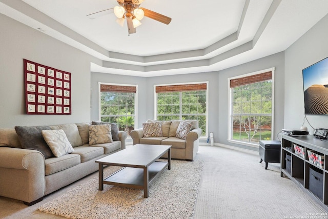 2929 Mccaskey Rdg, San Antonio, TX 78258 - carpeted living room featuring ceiling fan and a tray ceiling