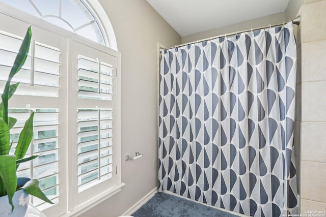 2929 Mccaskey Rdg, San Antonio, TX 78258 - bathroom with plenty of natural light and curtained shower