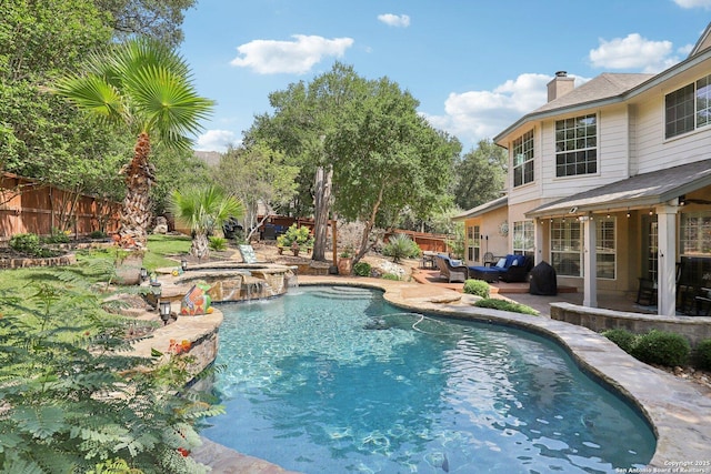 2929 Mccaskey Rdg, San Antonio, TX 78258 - view of pool featuring an in-ground hot tub, a fenced backyard, a patio area, and an outdoor hangout area