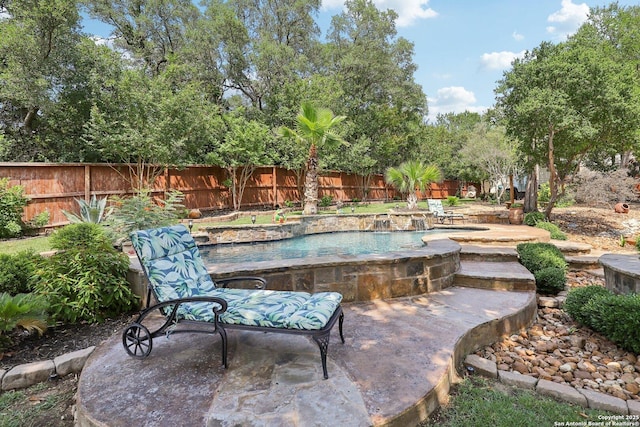 2929 Mccaskey Rdg, San Antonio, TX 78258 - view of swimming pool with a hot tub and a patio area