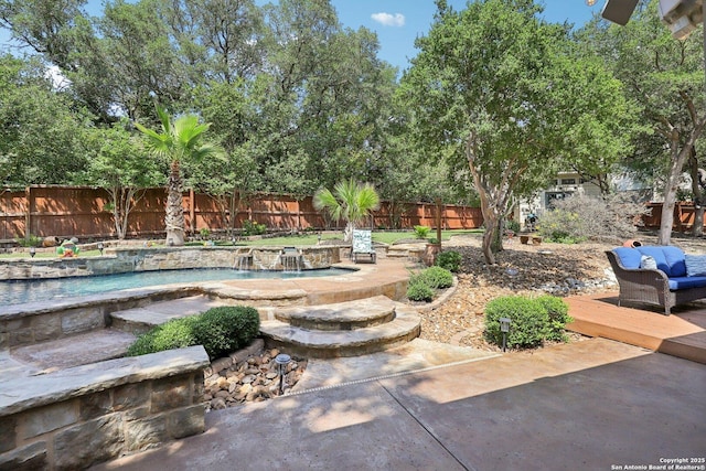2929 Mccaskey Rdg, San Antonio, TX 78258 - fenced backyard with a wooden deck, a jacuzzi, and a patio