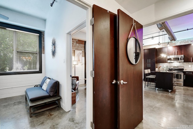 831 S Flores Unit 2212, San Antonio, TX 78204 - corridor with concrete flooring