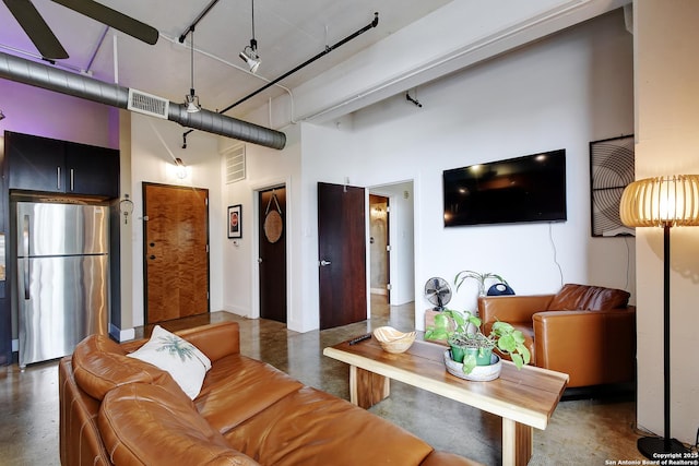 831 S Flores Unit 2212, San Antonio, TX 78204 - living room featuring concrete floors and a high ceiling