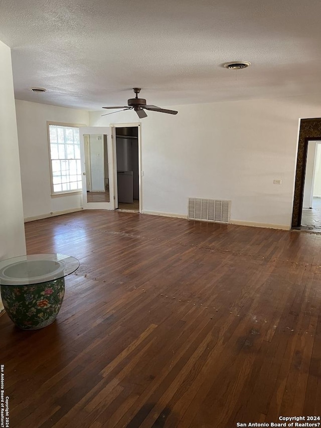 6514 W Ave, Castle Hills, TX 78213 - unfurnished living room with hardwood / wood-style floors, baseboards, ceiling fan, and a textured ceiling