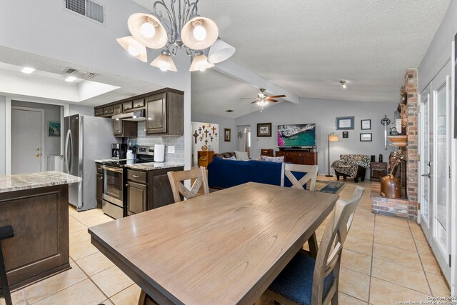 2866 Burning Rock, San Antonio, TX 78247 - dining room featuring light tile patterned floors, a chandelier, a textured ceiling, and ceiling fan