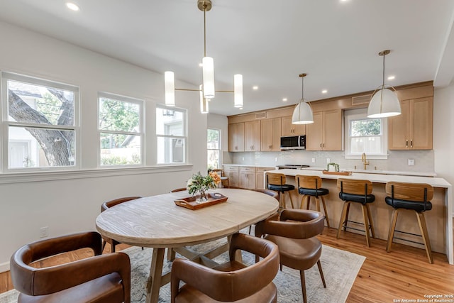 264 E Lullwood, San Antonio, TX 78212 - dining space with plenty of natural light, light wood-style floors, and recessed lighting