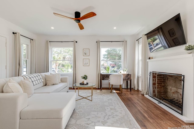 264 E Lullwood, San Antonio, TX 78212 - living room featuring plenty of natural light, ceiling fan, wood finished floors, recessed lighting, and a fireplace