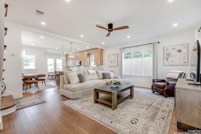 264 E Lullwood, San Antonio, TX 78212 - living room with ceiling fan, light wood-type flooring, recessed lighting, and baseboards