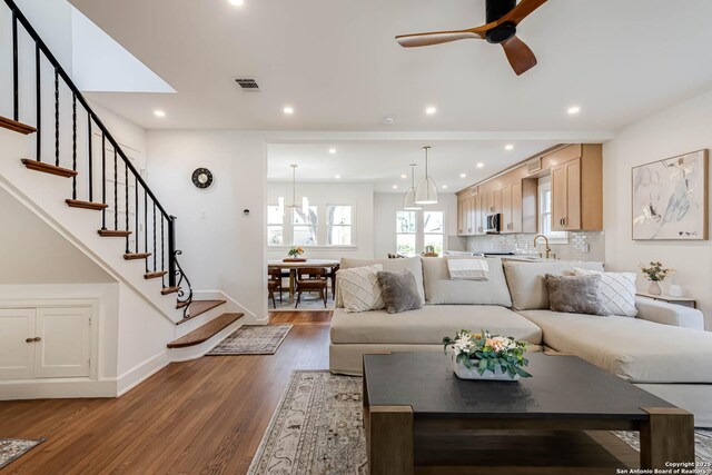 264 E Lullwood, San Antonio, TX 78212 - living area with wood finished floors, a ceiling fan, stairway, baseboards, and recessed lighting