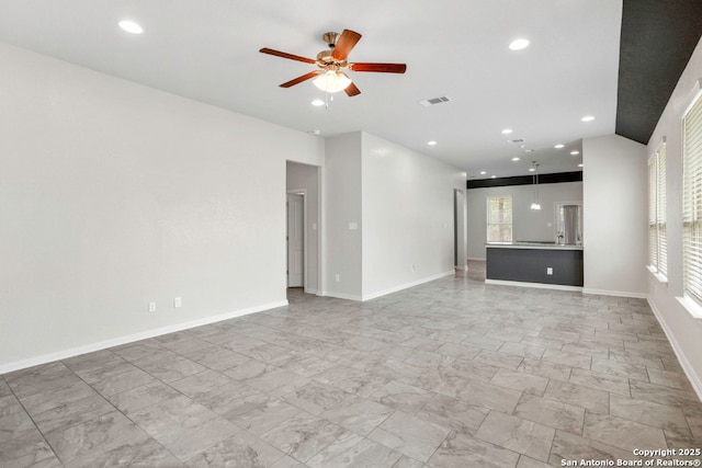 8339 Percheron Pass, San Antonio, TX 78254 - unfurnished living room featuring light marble finish flooring, a ceiling fan, recessed lighting, and baseboards