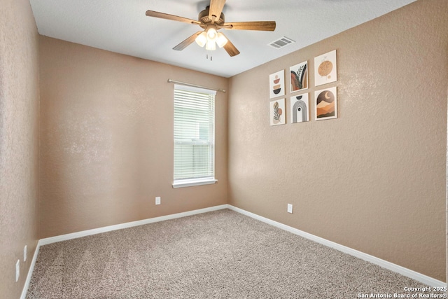8339 Percheron Pass, San Antonio, TX 78254 - carpeted empty room with a ceiling fan, baseboards, and a textured wall
