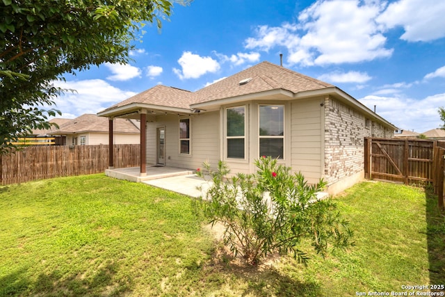 8339 Percheron Pass, San Antonio, TX 78254 - rear view of house with a patio area, brick siding, and roof with shingles