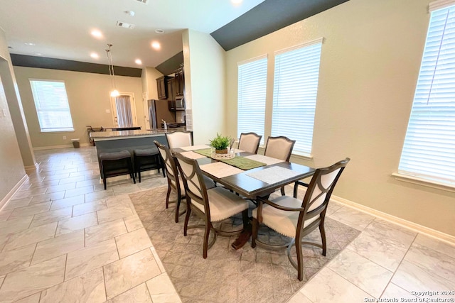 8339 Percheron Pass, San Antonio, TX 78254 - dining room with vaulted ceiling, baseboards, and recessed lighting