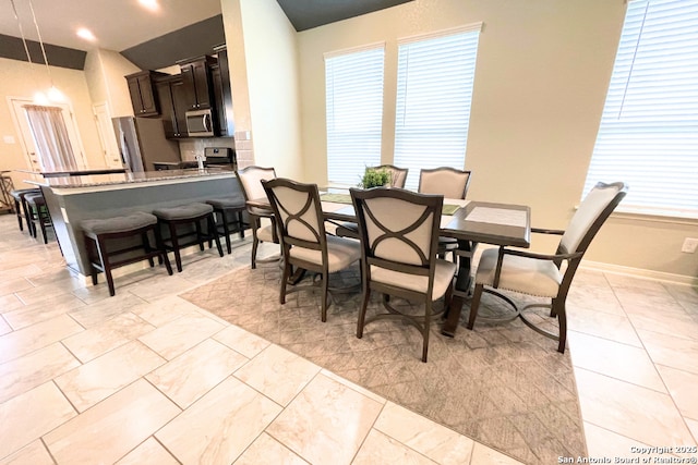 8339 Percheron Pass, San Antonio, TX 78254 - dining room with healthy amount of natural light and baseboards